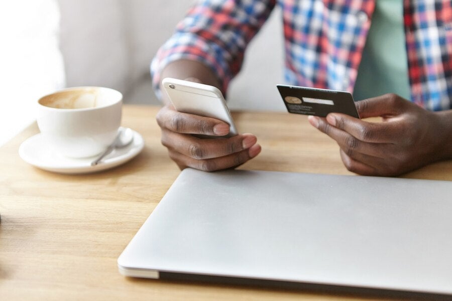 a young person making an online payment